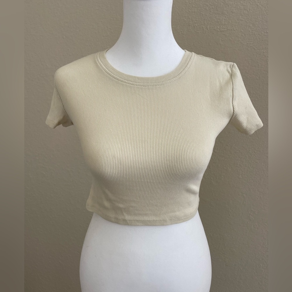 Off white, stretch fabric crop top.